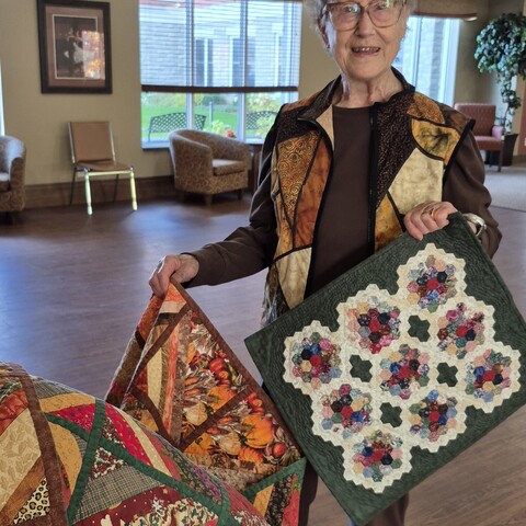 Barb a resident at Montgomery Village and her beautiful quilts